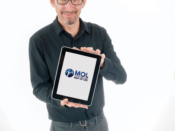 A scientist holding a tablet